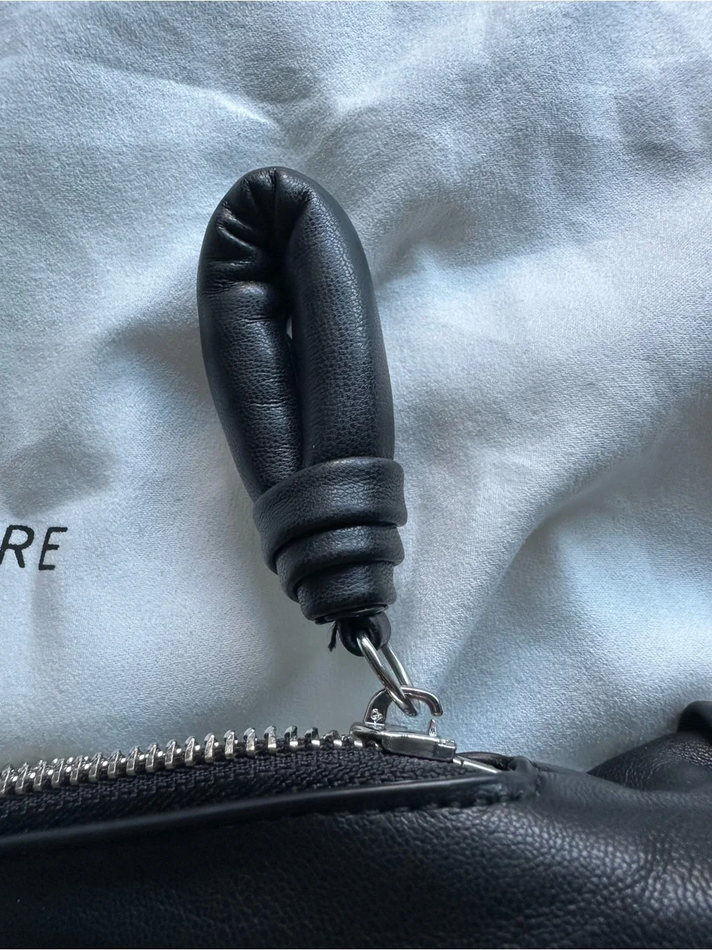 Black croissant bag
